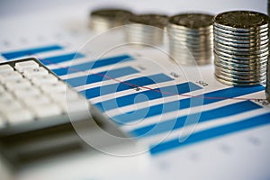 Stack of coin with bar graph