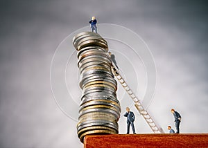 Stack of coins on abyss photo