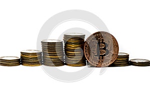 Stack of coins and a bitcoin. Crypto currency investment concept