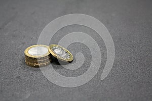 Stack of coins on a dark background