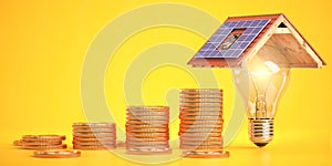 Stack of coins and  light bulb under a roof with solar panels.  Money saved  by using solar energy