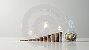 Stack of coins with virtual increasing graph. Financial investment and Saving money concept