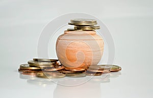 Stack of coins on white black ground