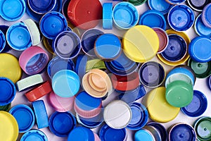 Stack of colored bottle tops