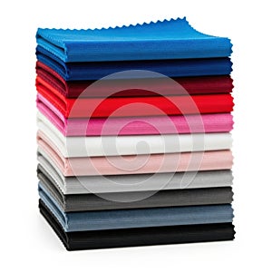 Stack of colored fabrics isolated on white background