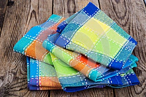 Stack of colored kitchen towels in box