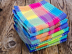 Stack of colored kitchen towels in box
