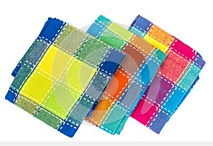 Stack of colored kitchen towels in box