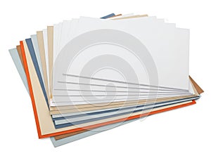 Stack of colored paper sheets isolated on white background