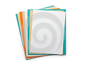 Stack of colored paper sheets isolated on white background