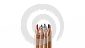 Stack of colored pencils on white background