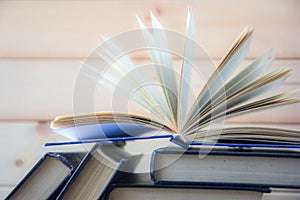 Stack of colorful books. Education background. Back to school. Book, hardback colorful books on table. Education