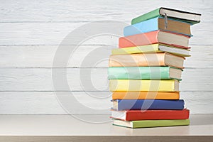 Stack of colorful books. Education background. Back to school. Copy space for text.