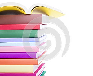 Stack of colorful books isolated on white background