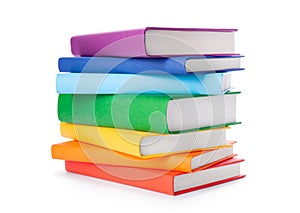 Stack of colorful books isolated on white background. Collection of different books. Hardback books for reading. Back to school