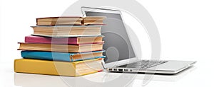 The stack of colorful books beside a modern laptop on a white surface. AI generated image