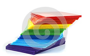 Stack of colorful corrugated plastic sheets