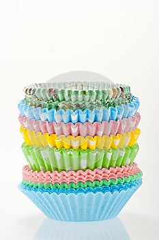 Stack of colorful cupcake cases