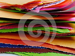 stack of colorful fabrics. Multicolor background