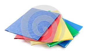 Stack of colorful file folders on white background