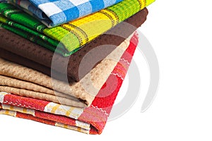 The stack of colorful kitchen towels. Textile dish wipes.