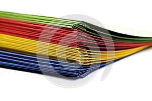 Stack of colorful loose-leaf binders