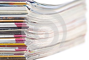 Stack of colorful magazines or documents