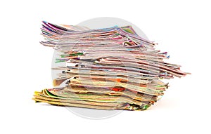 Stack of colorful magazines isolated on white