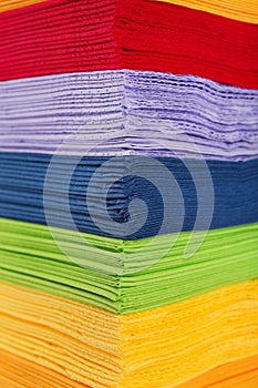 Stack of colorful paper napkins as background