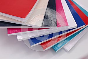 Stack of Colorful Paper Sheets Background