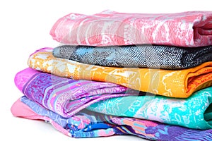 Stack of Colorful Patterned Scarves and Shawls