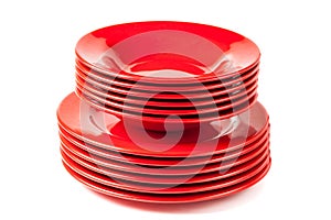 Stack of colorful red ceramics plates