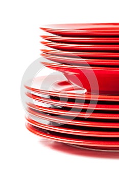 Stack of colorful red ceramics plates