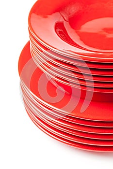 Stack of colorful red ceramics plates