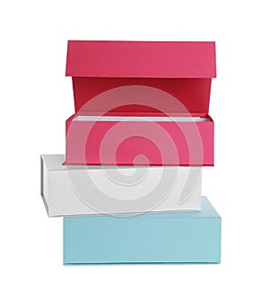Stack of colorful shoe boxes on white