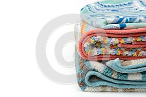 Stack of colorful towel, white background