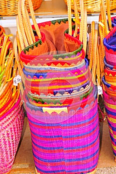 Stack of, colorful weaved baskets photo