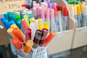 stack of coloured felt-tips at market store. selective focus. education and stationery concept. back to school concept