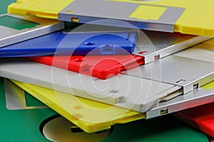 A stack of coloured floppy discs 1.44 MB 3.5 inch