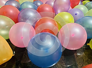 Stack of colourful balloons unique object photo