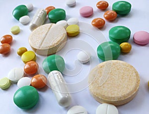 Stack of colourful pills, medicine background