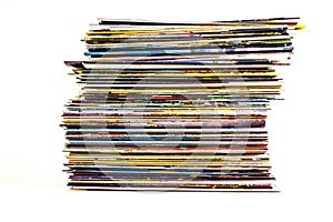 A stack of comic books isolated on a white background