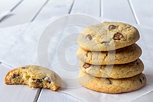 Stack Cookies with One Partly Eaten with Copy Space photo