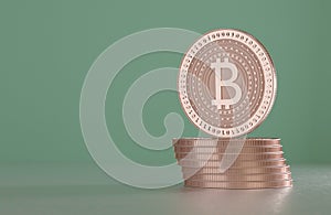 Stack of copper bitcoins as example for blockchain technology in front of blurry background