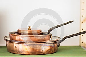 Stack of copper pans photo