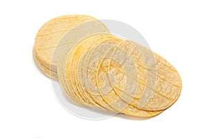 Stack of corn tortillas on white