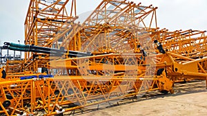 A stack of crane boom, lower section, middle section, upper section, and crane fly jib