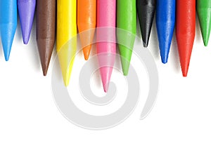A stack of crayons isolated on white background.