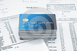 Stack of Credit Cards on Statements