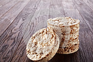 Stack of crispbreads on dark wooden table